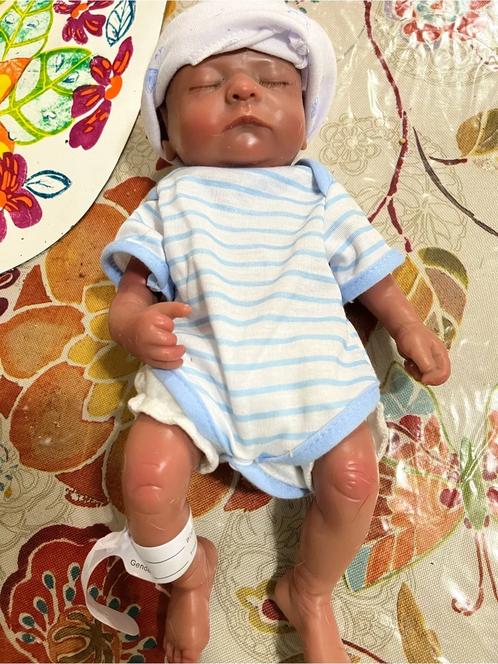 Reborn Brown Baby Doll with Blue & White Striped Outfit